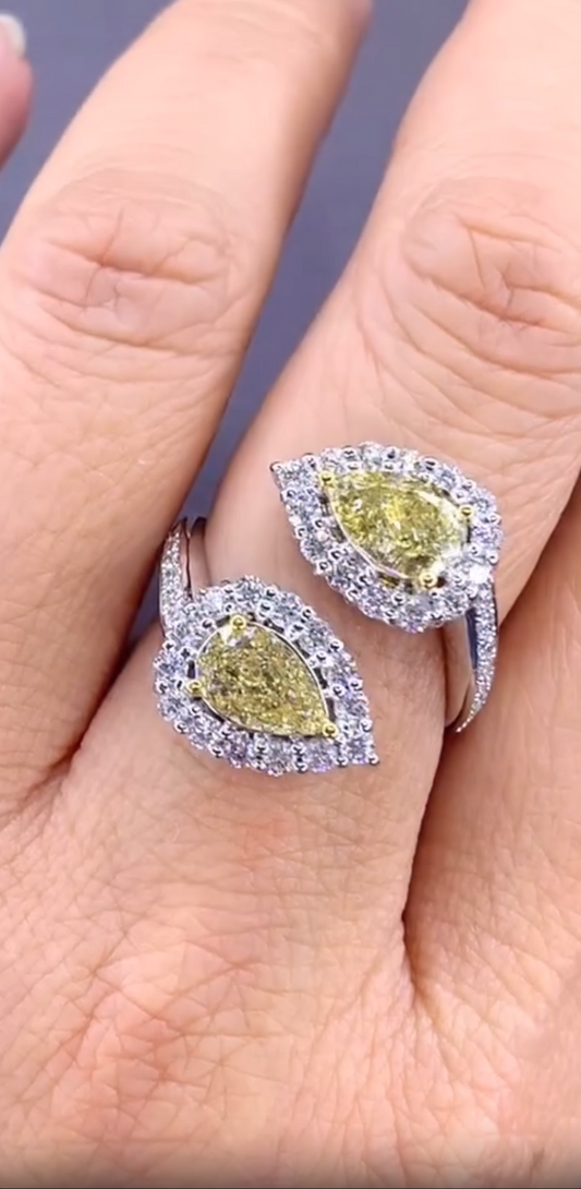 Pear shaped yellow diamond ring